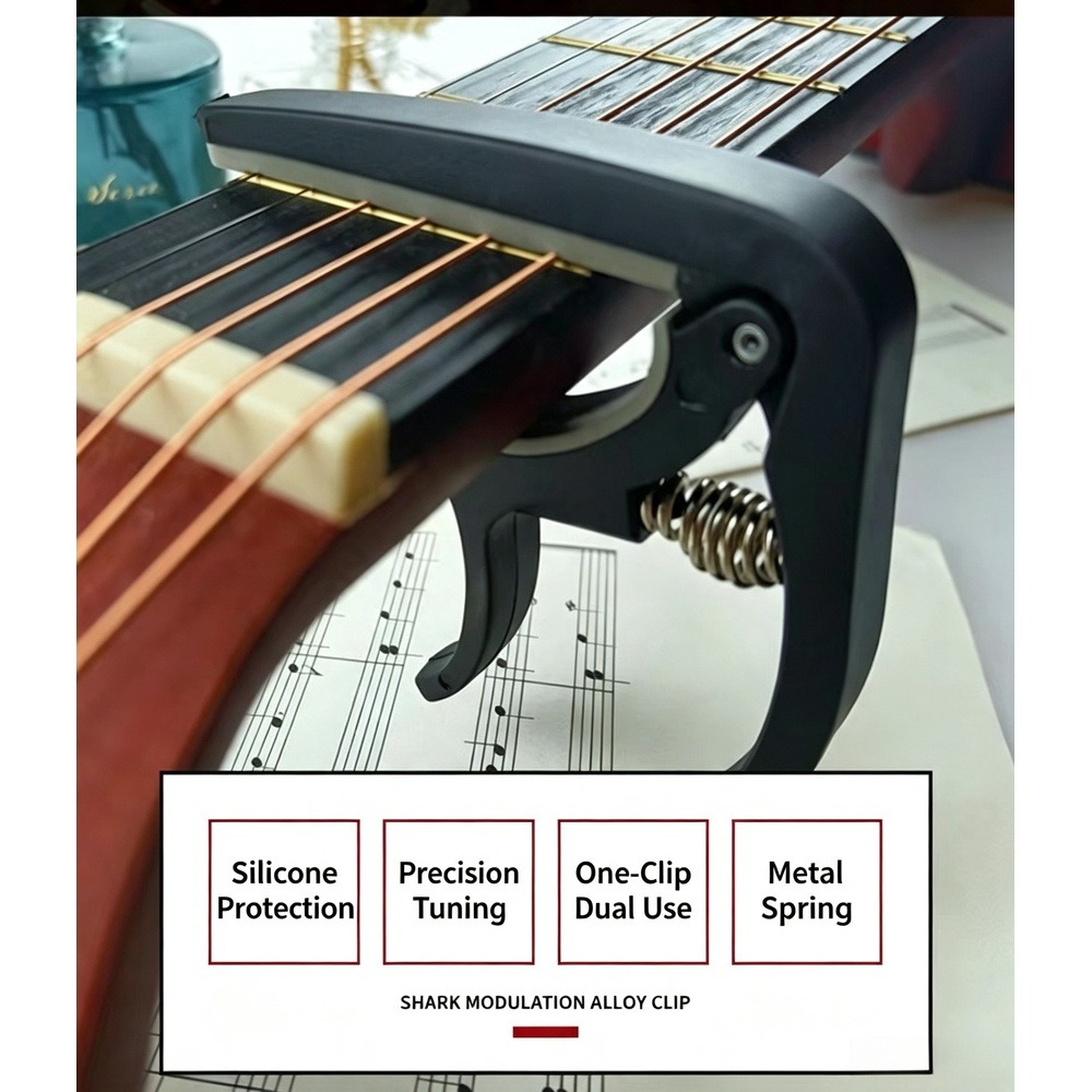 2-in-1 gitaarcapo met brugpinn - Guitar Capo Clip recensie en prijs